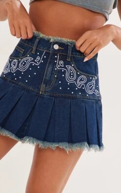 Indigo Vintage Wash Diamanté Raw Edge Pleated Denim Mini Skirt -Modern Wear Boutique 0ae4ce6380b37c37a8efb9bda5053d1ec9488904 cnc2023 5