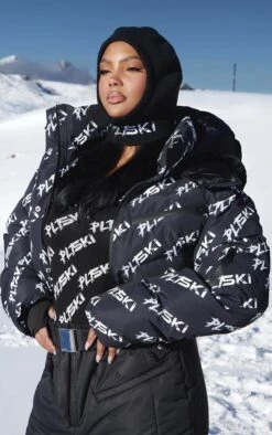 PRETTYLITTLETHING SKI Plus Black Faux Fur Hooded Printed Puffer