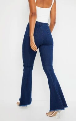 Indigo Raw Hem Extreme Bell Flare Jeans -Modern Wear Boutique 394c1f477ea2290f6e918e4c3eaca3ba498bd597 cmo1189 3