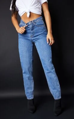 PRETTYLITTLETHING Mid Blue Bum Rip Mom Jeans -Modern Wear Boutique 3ba4a64b2a7f10e7d5750d7827a5c6288f291ea6 cmc4023 2