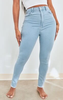 PRETTYLITTLETHING Shape Light Blue Wash High Waist Fray Hem Skinny Jeans -Modern Wear Boutique 44b6d4eb530c4f742bddabb574027e90365e76d0 cmu4725 2