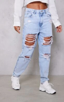 PRETTYLITTLETHING Light Blue Wash Ripped Mom Jeans 8 PRETTYLITTLETHING Light Blue Wash Ripped Mom Jeans -Modern Wear Boutique 44ebeabf204a9c13d6965220d1d11e3e49c21221 cmy6460 2