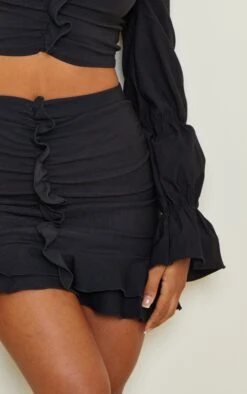 Black Woven Stretch Frill Ruched Front Mini Skirt -Modern Wear Boutique 49e5a15e489be16012bbdeb02de0368f790dde3f cmo9486 5