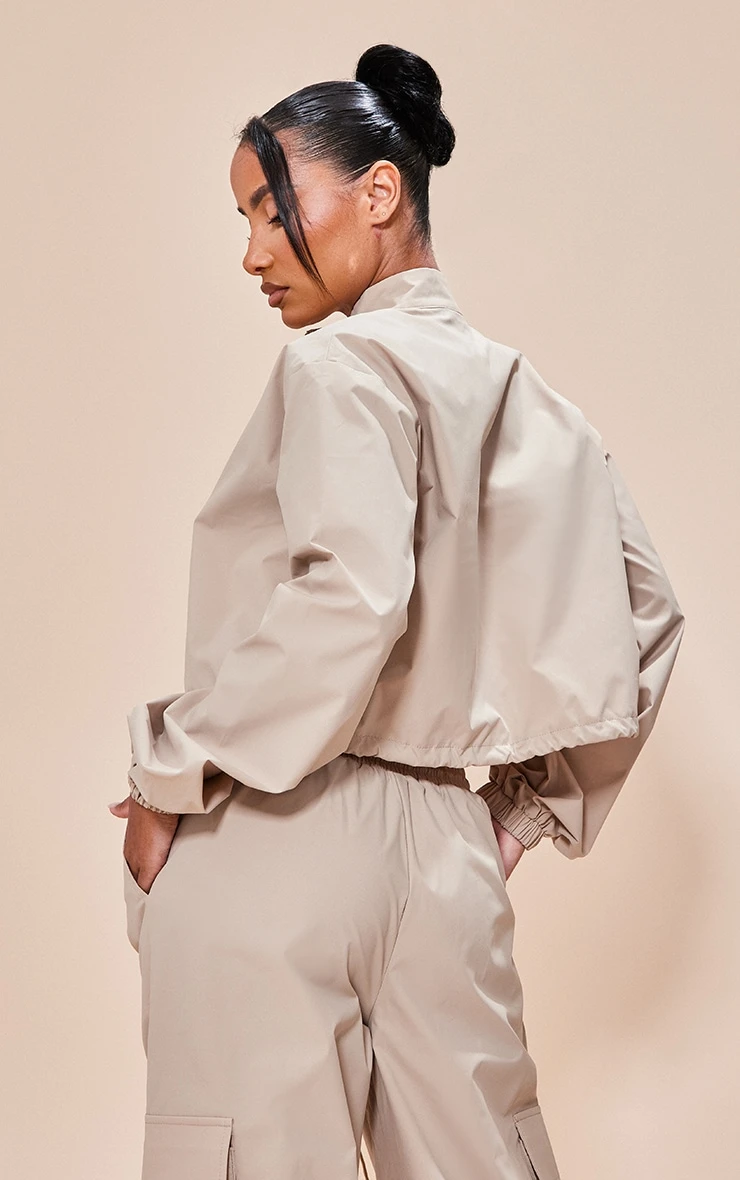 Stone Parachute Zip Up Toggle Hem Cropped Lightweight Jacket 2 Stone Parachute Zip Up Toggle Hem Cropped Lightweight Jacket - Image 2