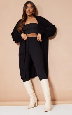 Black Ribbed Knitted Midi Cardigan -Modern Wear Boutique 4f6395781e3c5d9d7f20b8a041a2ac6a37b101d6 cma0835 3