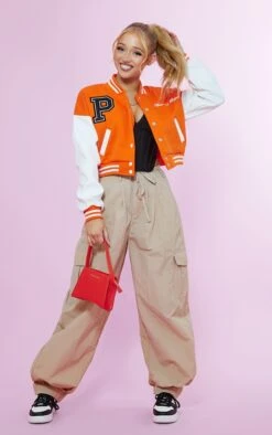 PRETTYLITTLETHING Orange Varsity Slogan Contrast Sleeve Bomber Jacket