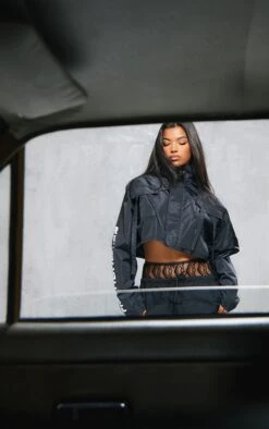 PRETTYLITTLETHING Black Slogan Boxy Cropped Windbreaker Jacket -Modern Wear Boutique 6e0678f8c38497383dca586b4cbefd3059db28a0 cnc0411 3