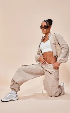 Stone Parachute Zip Up Toggle Hem Cropped Lightweight Jacket 7 Stone Parachute Zip Up Toggle Hem Cropped Lightweight Jacket -Modern Wear Boutique 6ee3ab620a17b84b7f816e06f51bf77987db99be cnd1471 3