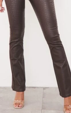 Chocolate Brown Croc Coated Denim Flared Jeans -Modern Wear Boutique 71099da6a2ed2456fc92c5393a8abcba11800dc4 imt1786 4