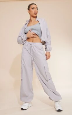 Light Grey Parachute Zip Up Toggle Hem Cropped Lightweight Jacket 7 Light Grey Parachute Zip Up Toggle Hem Cropped Lightweight Jacket -Modern Wear Boutique 754f425915e383148eb714a7945ec856c36baa6c cnd1472 3