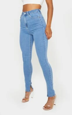 Light Blue Wash Side Split Hem Skinny Jeans -Modern Wear Boutique 81ac5bddb5173f4c192047e2c46fa5e81f132a5b CMK8883 2