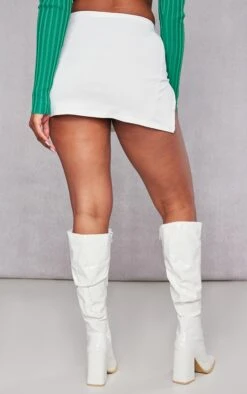 Cream Stretch Woven Extreme Split Hem Micro Mini Skirt -Modern Wear Boutique 828039a880c11001635c71cbb04a0a4d5ef37695 cnc8555 3