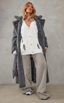 Cream Eyelash Knit Cut Out Oversized Cardigan -Modern Wear Boutique 87bce08da33a3c20525767c2d619be8e8525f625 cnb8425 3