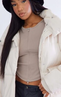 Cream Pocket Front Faux Leather Oversized Puffer -Modern Wear Boutique 988c8183ca56e73cf6d215a28711a33959766c52 cna8865 4