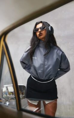 PRETTYLITTLETHING Charcoal Grey Oversized Toggle Hem Windbreaker -Modern Wear Boutique 9af5f39c433ed7616870c4d8884b4c75aa2be558 cnc0431 4