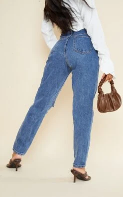 PRETTYLITTLETHING Dark Blue Knee Rip Mom Jeans -Modern Wear Boutique a4cff246510d86972d203baba39ae52253faec1a cmc3993 3