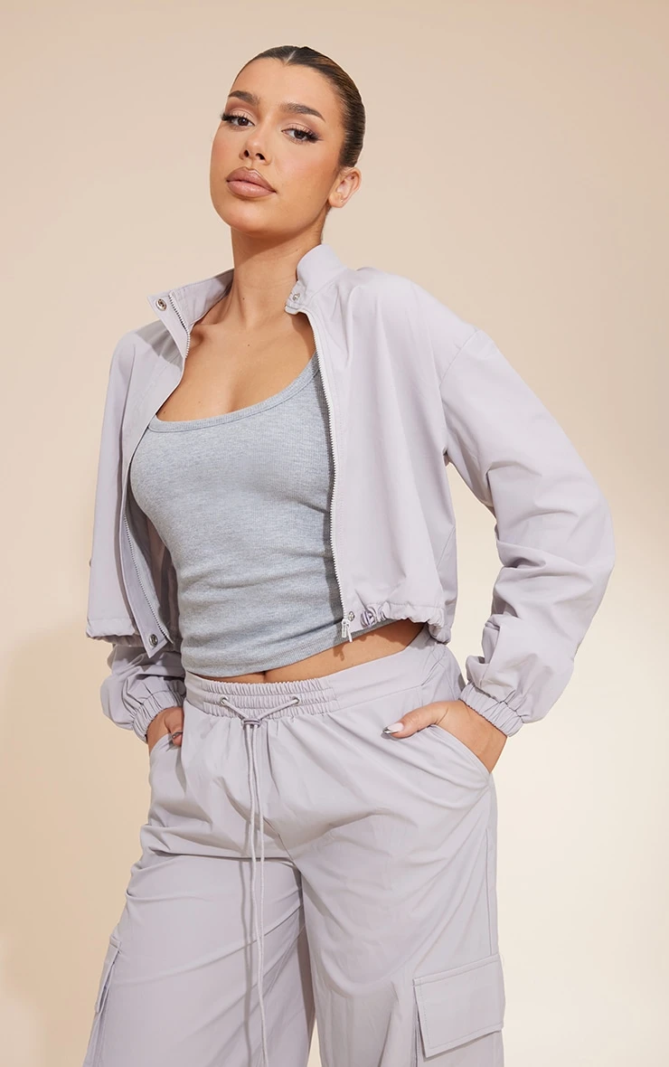 Light Grey Parachute Zip Up Toggle Hem Cropped Lightweight Jacket 1 Light Grey Parachute Zip Up Toggle Hem Cropped Lightweight Jacket