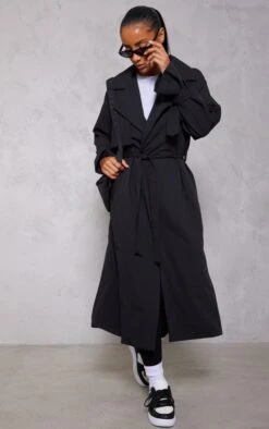Black Drapey Woven Longline Trench -Modern Wear Boutique ed3ccd83fcf809a05ad706e75bc2d9d15bed81a3 cna9695 3