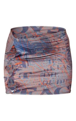 Brown Newspaper Print Slinky Cut Out Detail Micro Mini Skirt -Modern Wear Boutique f6460f03535f59682d2cc1b88a1d2ea71e66c955 cna3696 6