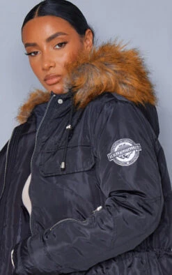 PRETTYLITTLETHING Black Nylon Faux Fur Hooded Parka Jacket 10 PRETTYLITTLETHING Black Nylon Faux Fur Hooded Parka Jacket -Modern Wear Boutique f7c650d3b321dddd4a56327cb604002c7c975be5 cmn7925 4